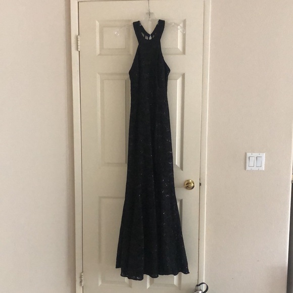 Gorgeous black mermaid halter style gown tag says size 9 fits like a medium
